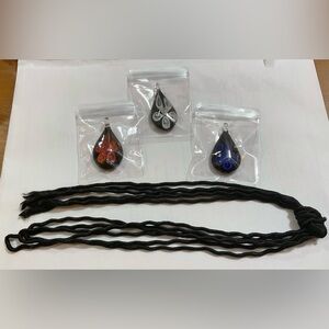 Murano: set of 3  handcrafted/ made blown glass teardrop shaped floral pendants.